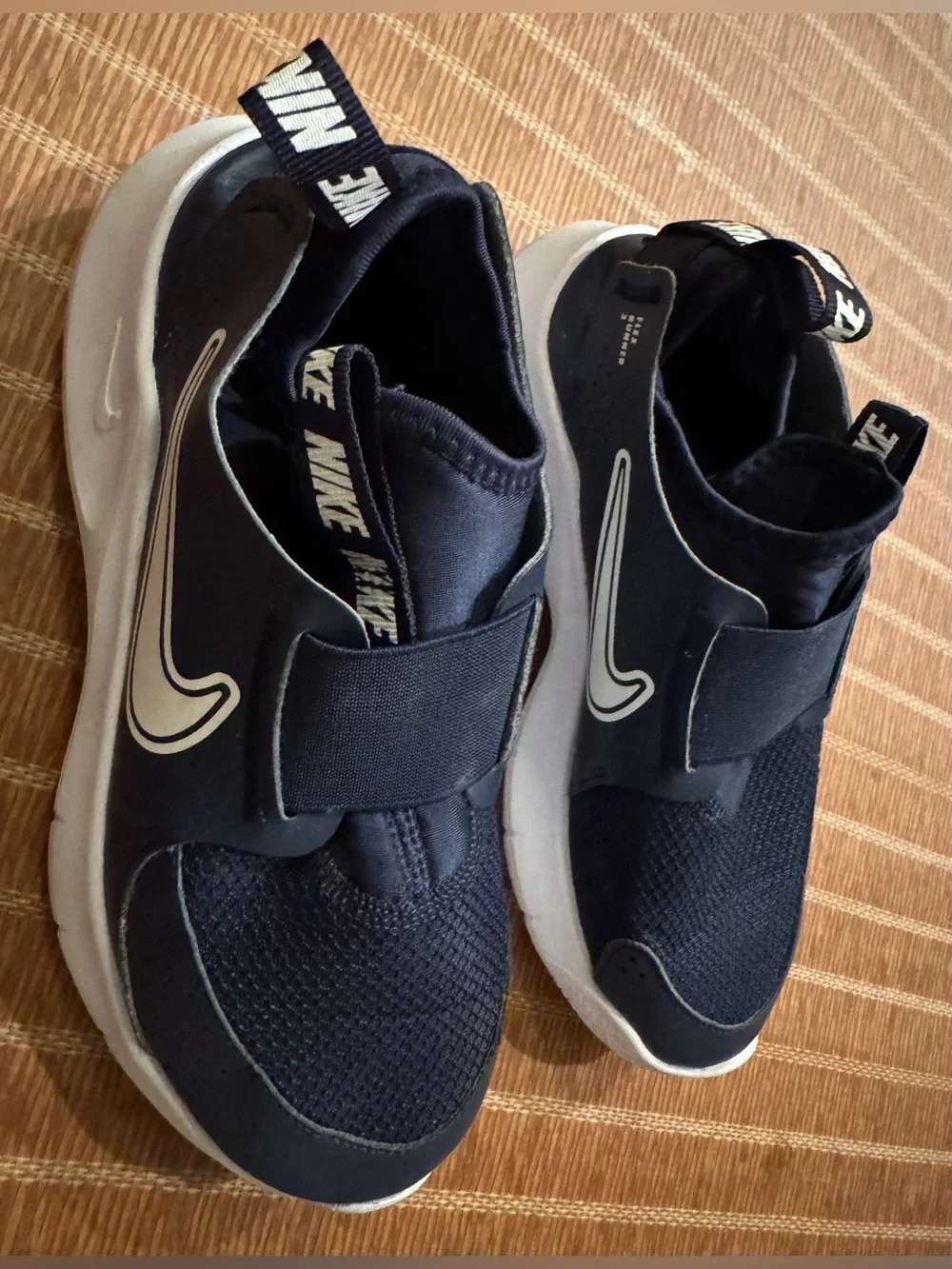 Nike Girls Navy and White Slip-On Sneakers with Logo Strap